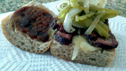 Smoked Beef Brisket Barbecue Sandwich with sauteed onions and peppers from Paggi Pazzo