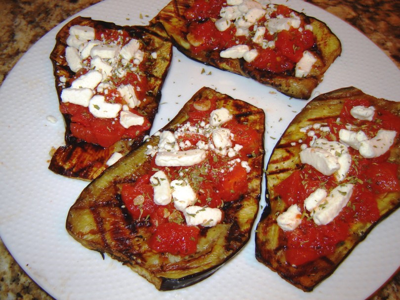 Grilled eggplant topped with a diced tomato sauce and goat cheese from Paggi Pazzo