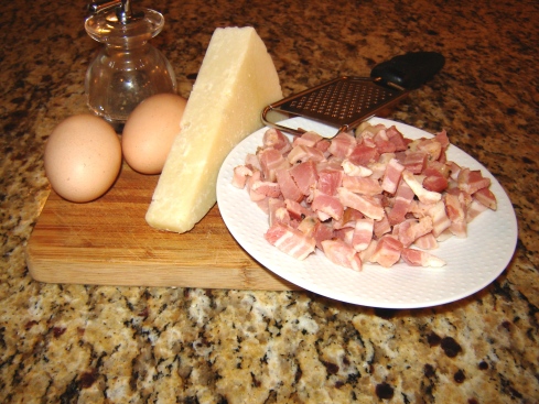 Authentic Roman Pasta alla Carbonara recipe ingredients including pancetta, Pecorino Romano, eggs, spaghetti, black pepper and olive oil from Paggi Pazzo