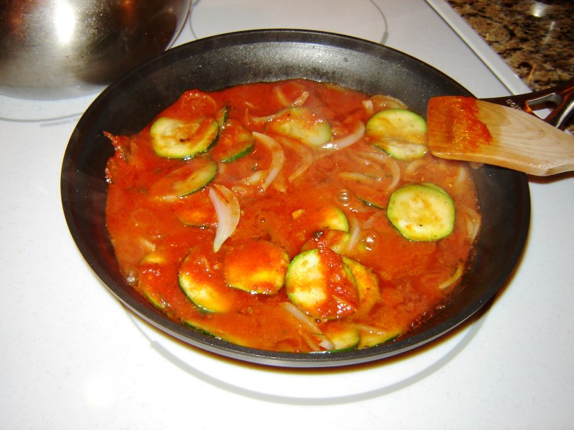 Easy recipe for zucchini, onion, and red sauce as a side dish or appetizer with bread or crackers from Paggi Pazzo!