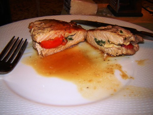 Stuffed pork with sliced cherry tomatoes, chunks of Pecorino Romano and spinach from Paggi Pazzo