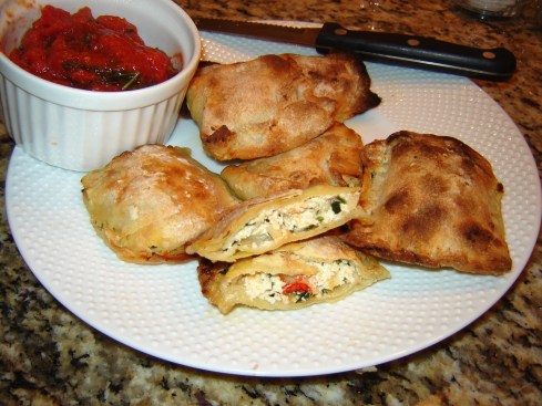 Homemade fresh lobser ravioli, toasted with a side of red sauce from Paggi Pazzo!