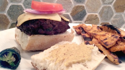 Grilled cheeseburger with chopped jalapeño, honey barbecue sauce, topped with Monterrey jack peppercorn cheese from Paggi Pazzo