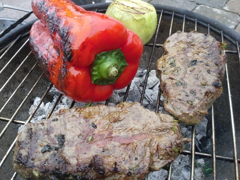 Grilled Mexican style steak fajitas with red peppers, onions, and seasoned steak from Paggi Pazzo.