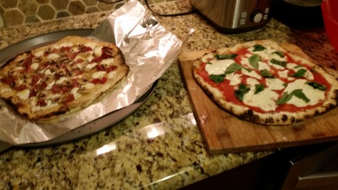 Pizza Margherita grilled over wood fire